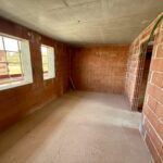 Ein helles Schlafzimmer in einem Neubau- Reiheneckhaus in Großkarolinenfeld